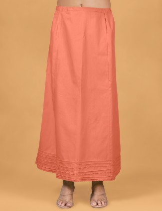 Dark peach plain saree petticot
