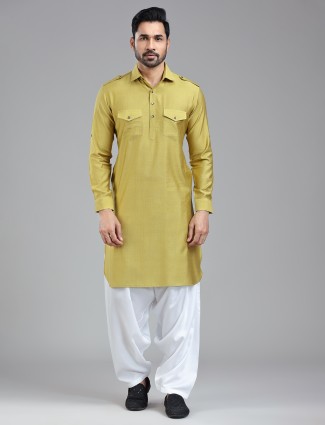 Radiant golden pathani kurta set for a bold style