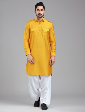 Lively mustard yellow pathani with salwar for a dynamic look