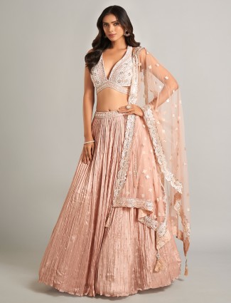 Trendy peach laycra lehenga choli