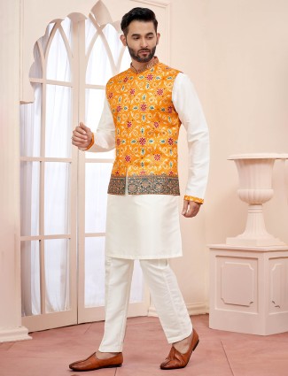 Elegant yellow and white waistcoat set with intricate work