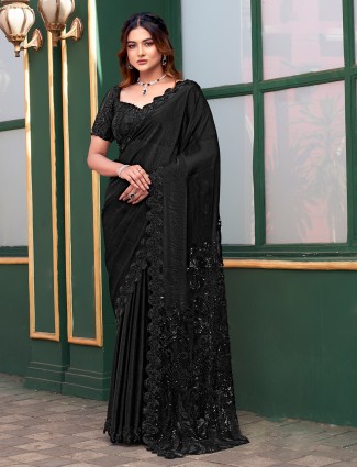 Black net saree with gentle shine and work