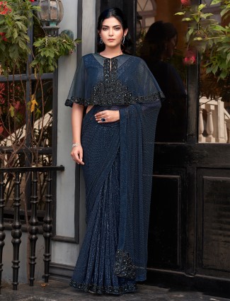 Navy net saree with beaded jacket style blouse