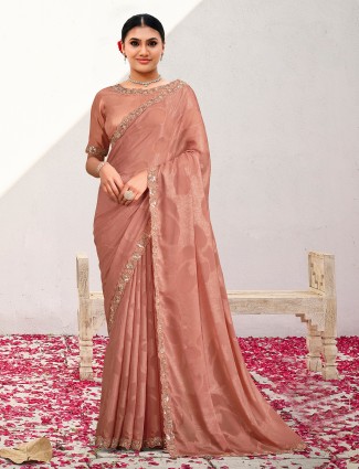 Golden radiance tissue silk saree with royal embellishments