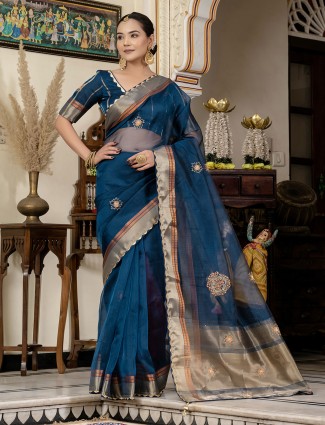 Graceful rama blue linen saree with zari weaving