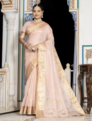 Golden radiance tissue silk saree with royal embellishments