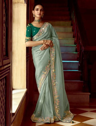 Golden radiance tissue silk saree with royal embellishments