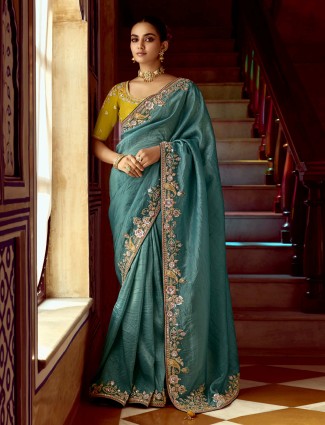Golden radiance tissue silk saree with royal embellishments
