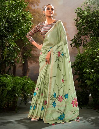 Pista green linen saree with floral print