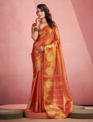 Orange tissue silk saree with zari detailing