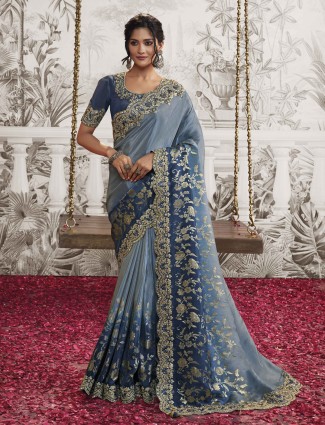 Golden radiance tissue silk saree with royal embellishments