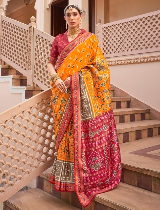 Orange elegant silk saree with printed design