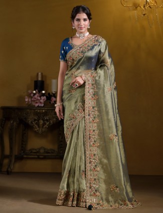 Golden radiance tissue silk saree with royal embellishments