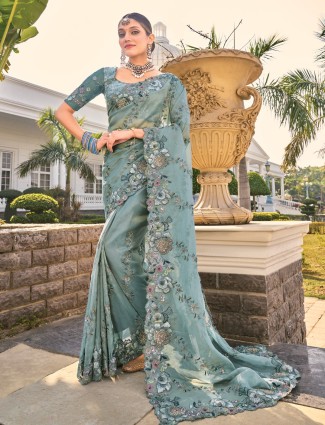 Golden radiance tissue silk saree with royal embellishments