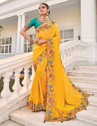 Golden radiance tissue silk saree with royal embellishments