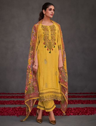 Yellow zari worked salwar suit in muslin silk