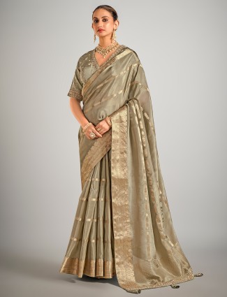 Golden radiance tissue silk saree with royal embellishments