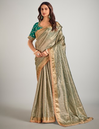 Light green tisse silk zari weaving wedding wear saree