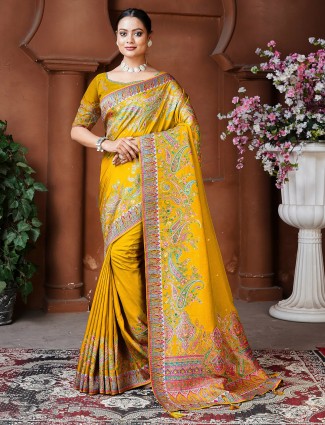 Golden radiance tissue silk saree with royal embellishments