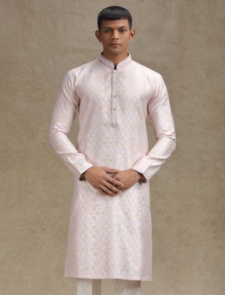 Graceful pink kurta pajama set enhanced with zari work