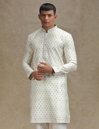 Pista green and cream kurta pajama set embellished with zari
