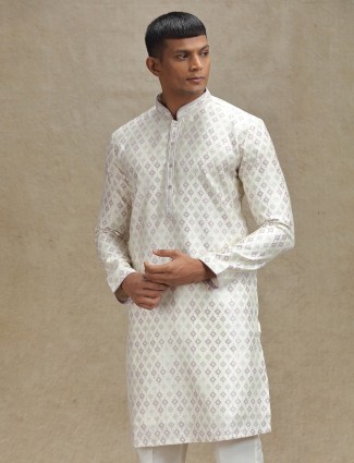 Elegant purple and cream kurta pajama set with zari details