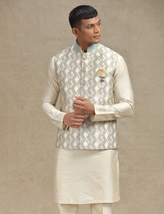 Cream and pista waistcoat set for festive celebrations