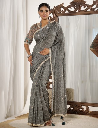 Elegant grey printed muslin saree with matching blouse