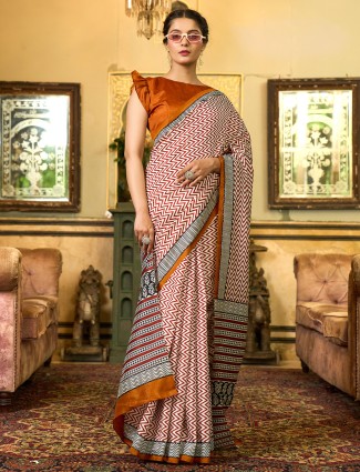 Golden radiance tissue silk saree with royal embellishments
