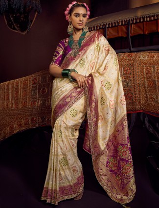 Golden radiance tissue silk saree with royal embellishments