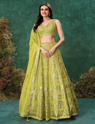 Graceful green organza lehenga for wedding ceremonies