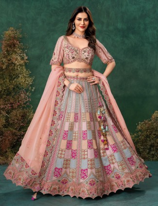 Blush pink raw silk lehenga perfect for wedding festivities