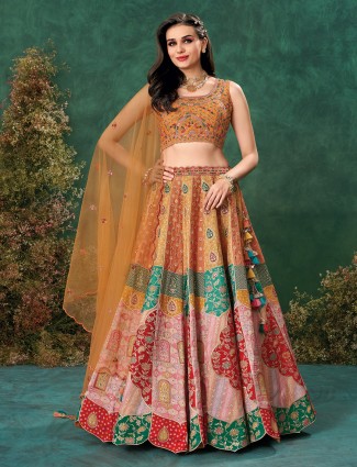 Peach printed waw silk lehenga for elegant wedding looks