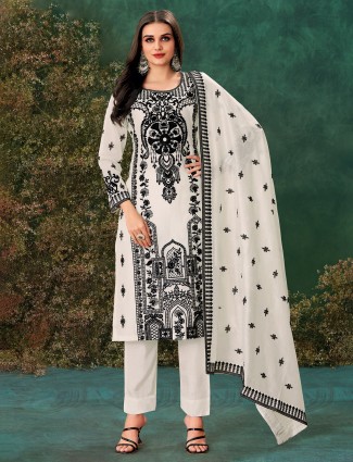 Pure white chanderi suit featuring elegant thread embroidery