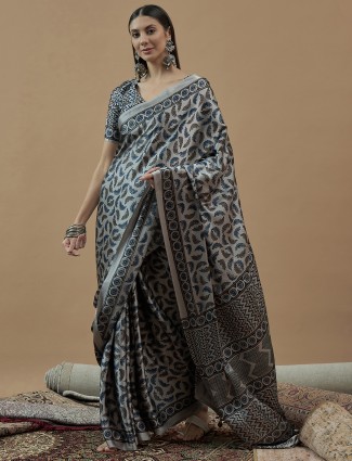 Golden radiance tissue silk saree with royal embellishments