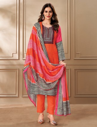 Bright orange ethnic attire in printed dola silk