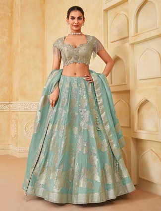 Mint blue silk lehenga with zari glow
