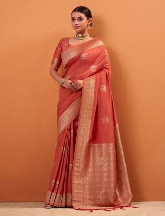 Peach tusser silk saree adorned with zari weaves