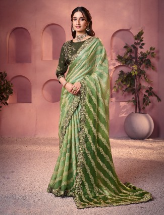 Golden radiance tissue silk saree with royal embellishments