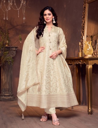 Cream silk suit with zari and embroidery