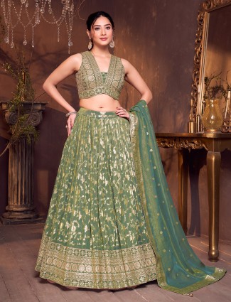Pista green silk V neck zari detailed lehenga choli