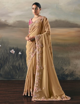 Beige tissue silk mirror work saree