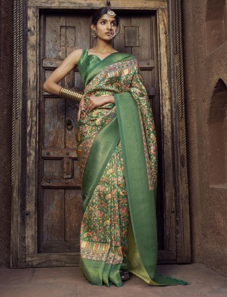 Green silk saree with elegant zari for women