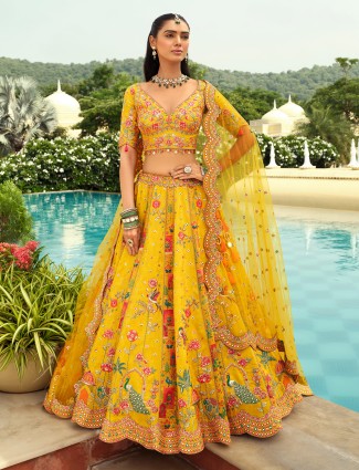 Yellow silk lehenga with peacock art