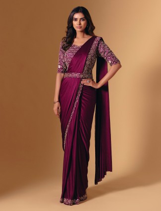 Ddark purple lycra saree with rich sparkling details