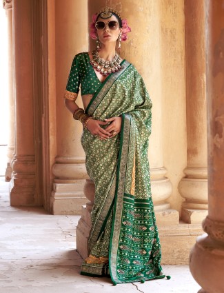 Green festive patola silk saree