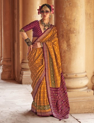 Mustard yellow wedding patola saree