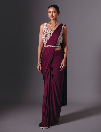 Wine lycra saree with sparkling festive embellishments