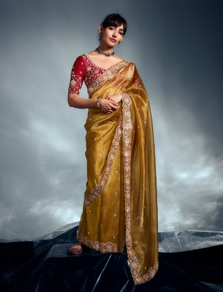 Yellow organza saree with decorative sparkle