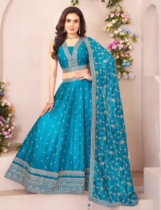 Aqua silk lehenga choli with shimmering wedding grace